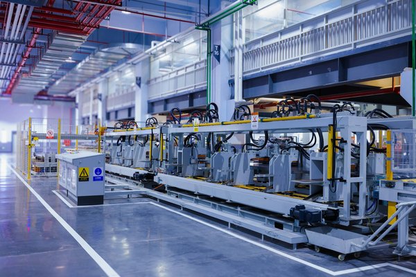 How can AI-driven predictive maintenance reduce downtime in manufacturing?